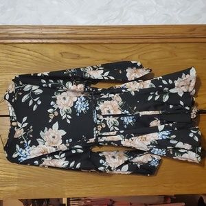 Womens small black long sleeve dress. Ruffle bottom. With blush and blue details